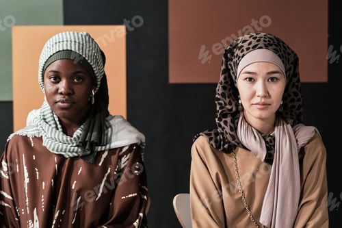 Preview: Two muslim women sitting at office