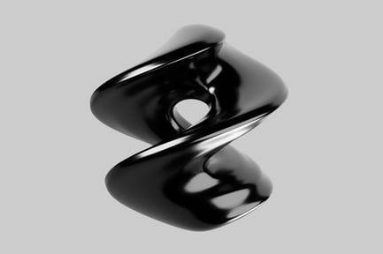 Black and reflective object with a circular hole.