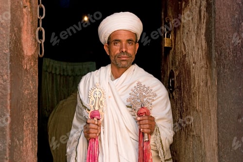 Preview: priest at ancient rock hewn churches of lalibela ethiopia