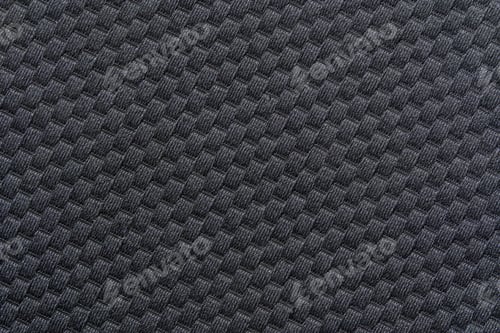 Preview: Close up of black textured fabric with repetitive pattern and geometric design