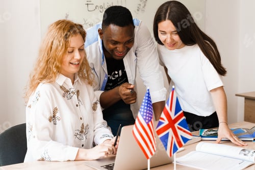 Preview: Multiethnic students and black teacher studying foreign languages, smiling and laughing together.