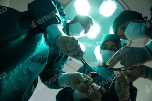 Preview: Surgical Team Performing Surgery Under Bright Lights