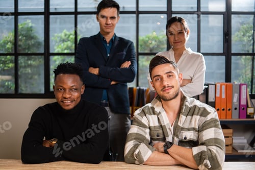 Preview: Portrait diversity group of young creative designer team sitting at desk