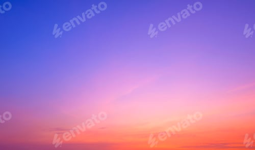 Preview: Evening sky with colorful pink orange natural gradient light on blue romantic twilight sky