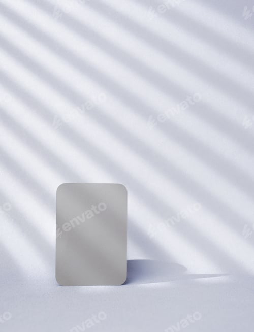 Preview: blank grey paper card wiht window sunlight on pastel violet background
