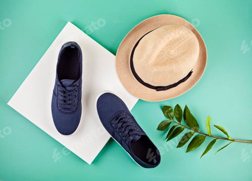 Preview: Blue marine sneakers shoes over aquamarine backgroung