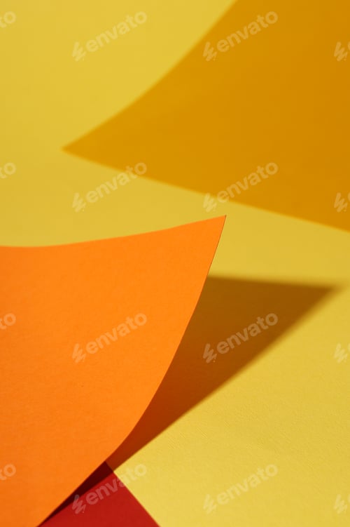 Preview: Different colorful paper sheets on yellow background