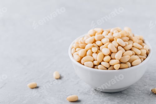 Preview: Raw pine nuts in bowl