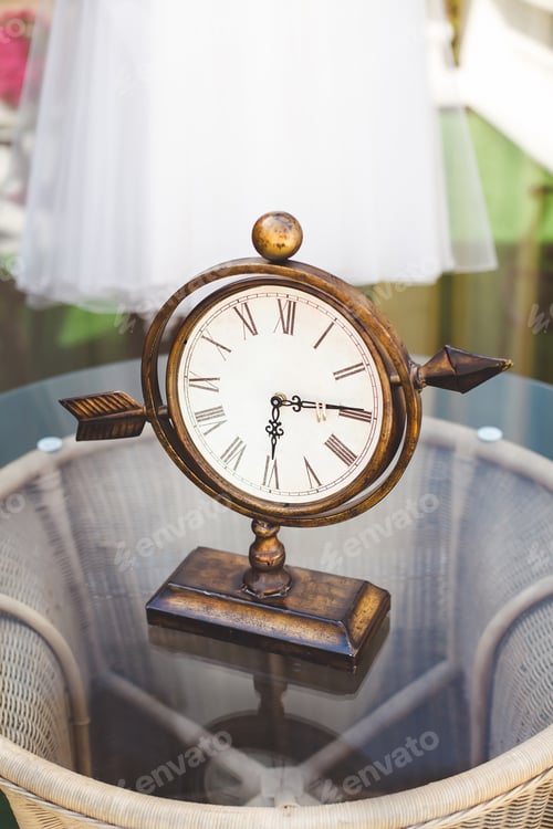 Preview: Wedding rings. Watch. Table.