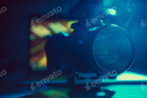 Preview: DSLR Video Camera with Telephoto Lens Attached