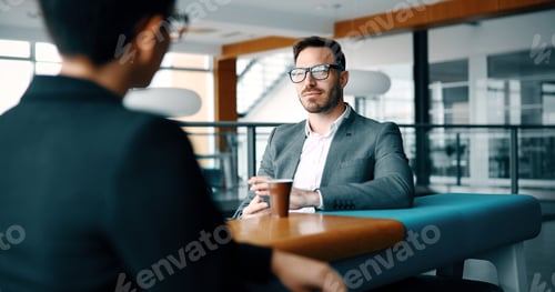 Preview: Business people conference in modern office