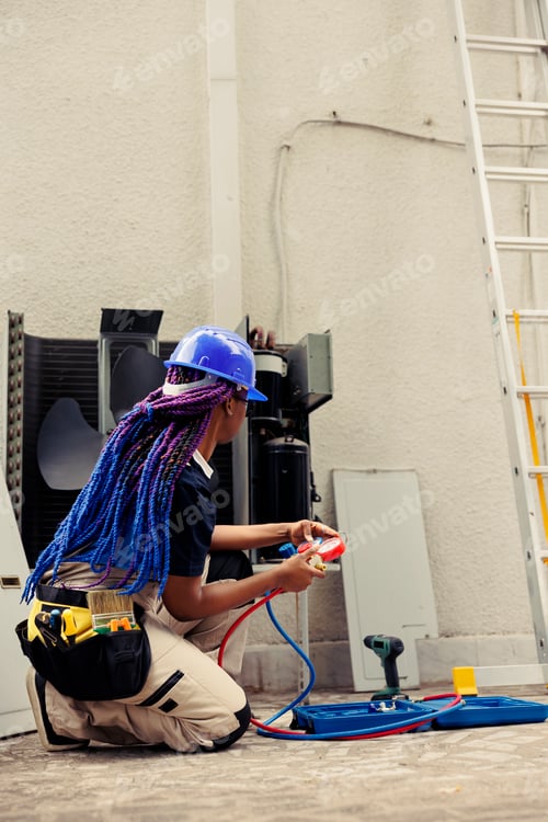 Preview: Repairman prepares for condenser checkup