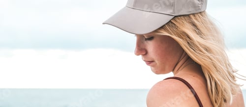 Preview: Traveler girl resting on the beach near the sea. Eco travel, taking care of yourself physical and