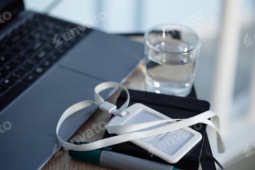 Preview: Plastic ID Card Holder for Conference Participant Placed on Desk in Auditorium