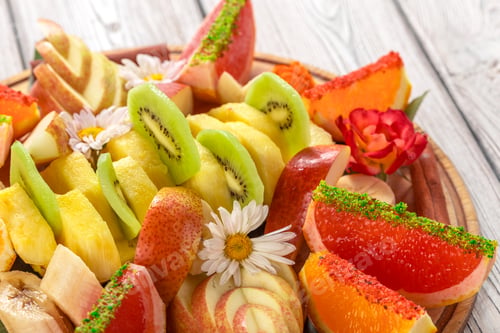 Preview: Fresh fruits in plate on wooden table