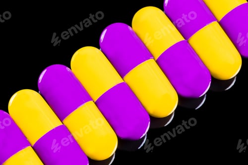 Preview: Closeup shot of pills on black background