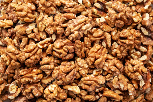 Preview: Raw Organic Walnuts background, top view. Flat lay, overhead, from above.