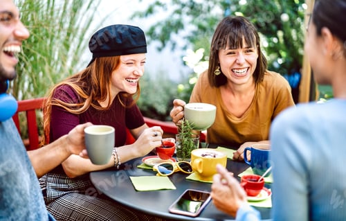 Preview: Friends group drinking latte at coffee bar restaurant