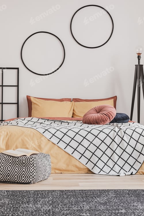Preview: Stylish bedroom design with orange and yellow colors in modern apartment
