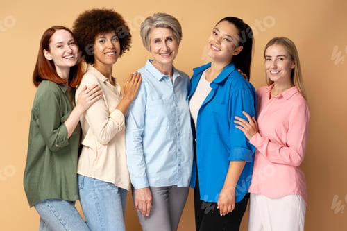 Preview: Smiling multiracial women wearing stylish shirts looking at camera isolated on background