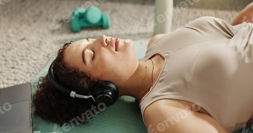 Preview: Music, woman and relax on floor for yoga, wellness or self affirmation audio for positive mental he