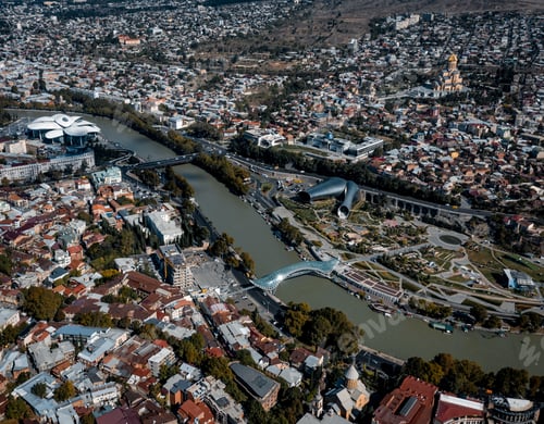 Preview: Aerial shot of buildings, bridges and a river in a city at daytime