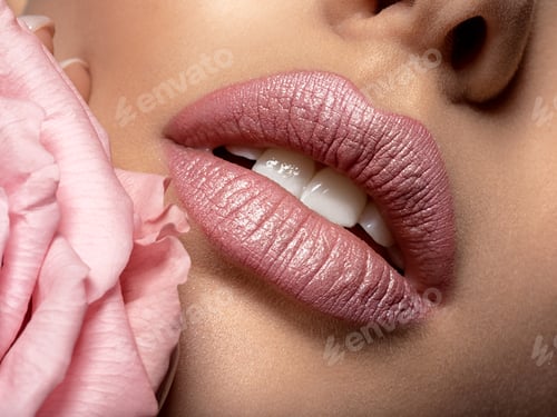 Preview: Closeup sexy female lips with pearl lipstick. Women's lips and p