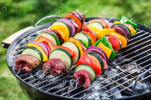 Preview: Roasting fresh beef and vegetables with herbs in garden