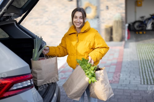 Preview: Woman arrives home with purchases