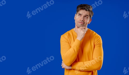 Preview: Thinking Man Looking Up, Searching Opportunity On Blue Studio.Curious copy space