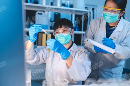 Preview: researcher working in laboratory for medicals science research using scientific equipment technology