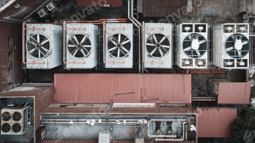 Preview: Air conditioner compressor installed on the roof of a building