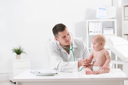 Preview: Children's doctor examining baby with stethoscope in hospital