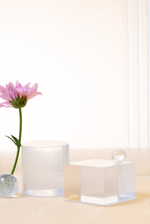 Preview: Glass podium and flower minimal scene on a beige background. Stand to show cosmetic product.