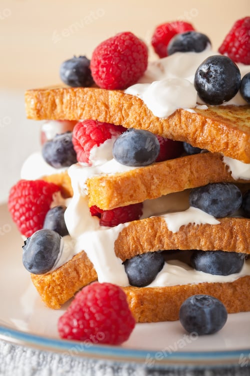 Preview: french toasts with creme fraiche and berries for breakfast