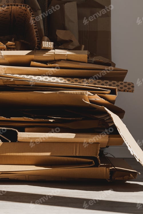 Preview: Stack of Cardboard Waste in sunlight. Concepts of Paper Recycling and Waste Sorting