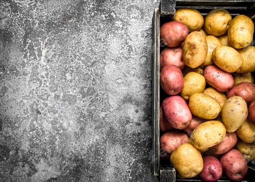 Preview: Fresh potatoes in a box.