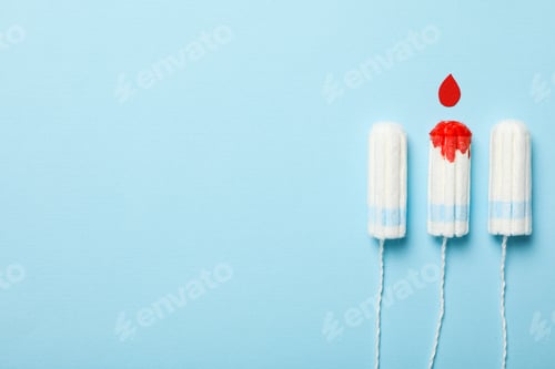 Preview: Tampons for menstrual days on a blue background
