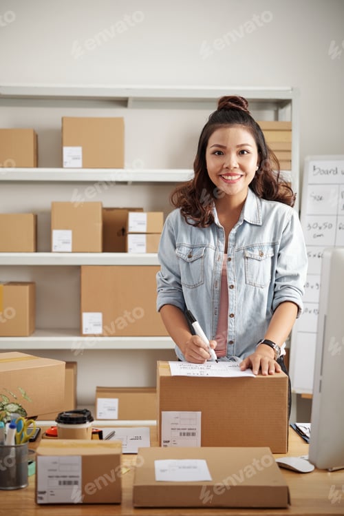 Preview: Smiling Asian Woman In Postal Office