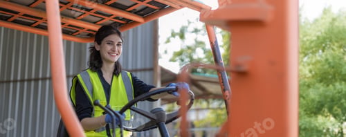 Preview: WoMan worker at forklift driver happy working in industry factory logistic ship.