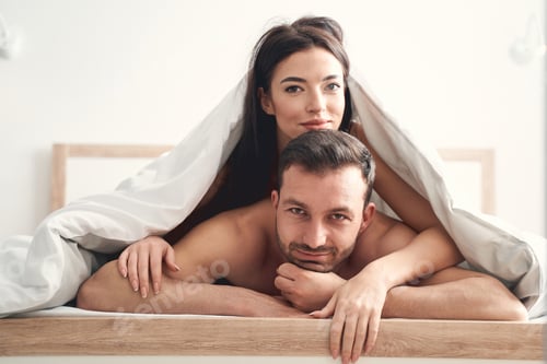 Preview: Dark-haired lady lying on a mans back
