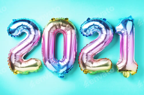 Preview: Colorful foil balloons made numbers 2021 on blue background with light bokehs. Happy new year
