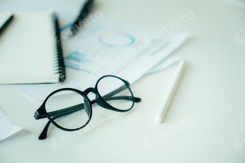 Preview: Close up image of black eyeglasses.