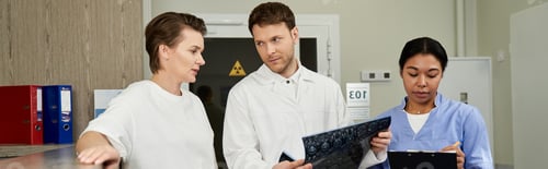 Preview: Professional healthcare team prepares patient for MRI scan in modern facility setting