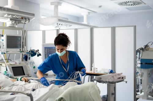 Preview: Nurse monitoring patient in intensive care unit
