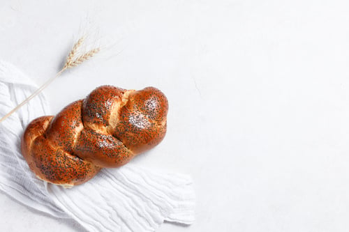Preview: Homemade crusty loave of wheat candy bun with poppy seed