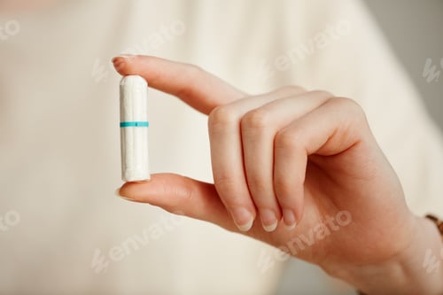 Preview: Hand Holding Tampon Closeup