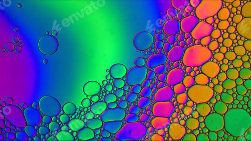 Preview: Abstract Colorful Food Oil Drops Bubbles and spheres Flowing on Water Surface