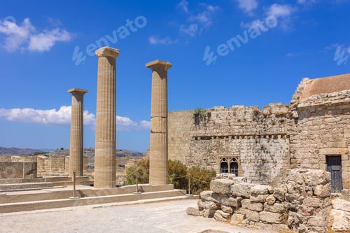 Preview: Panoramic view of ruins of ancient city of Lindos on colorful island of Rhodes, Greece. Famous