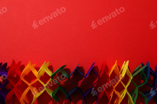 Preview: LGBT parade concept, colorful symbols on red background.